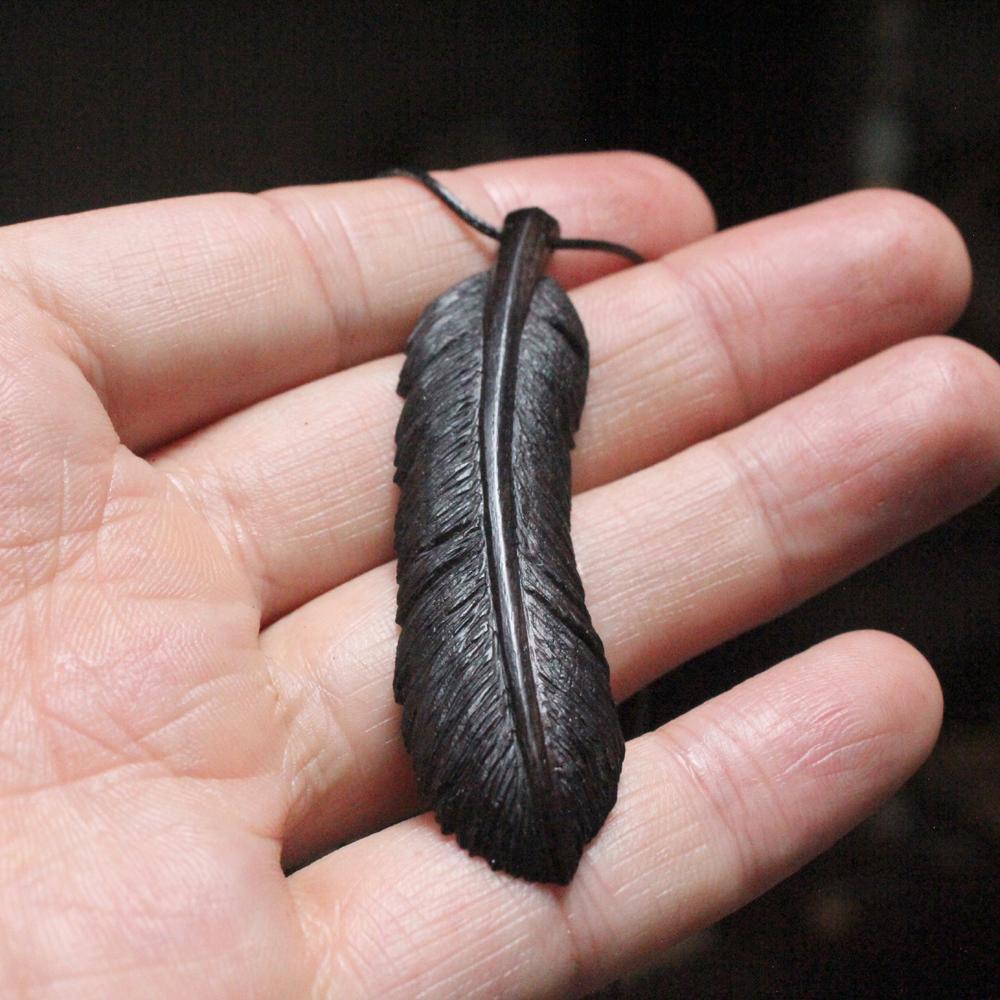 Sandal wood fashion feather pendant