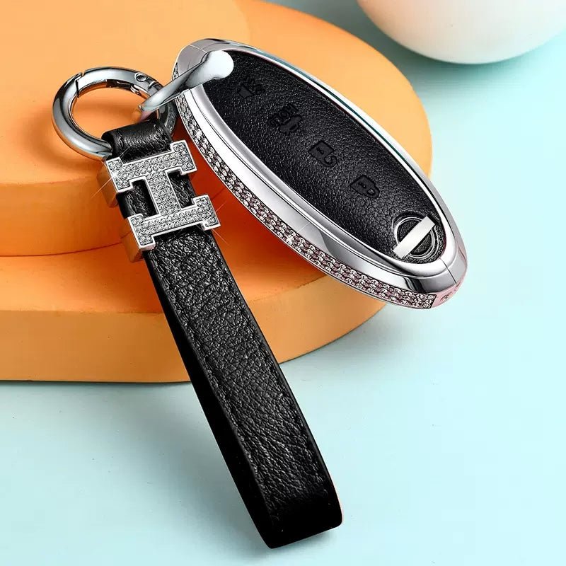 Nissan Alloy + Cow Leather Car Key Case (Four buttons, the last button is "Trumpet")